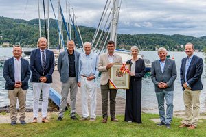 Burkhardt Joppke, Alexander Gmeiner, Franz Urban, LHStv. Martin Gruber, Präsident Wolfgang Hofmann, LHStv.in Gaby Schaunig, Peter Kuss und Bgm. Markus Perdacher. Foto: LPD Kärnten/Jannach