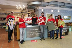 Die Mitarbeiterinnen und Mitarbeiter der Carla Shops laden zur Aktionswoche ein und freuen sich auf die Besucherinnen und Besucher. Foto: Caritas 