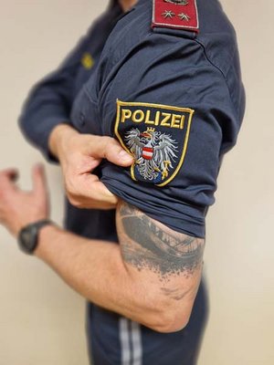 In Zukunft sind auch sichtbare Tätowierungen bei der Polizei erlaubt. Foto: BMI